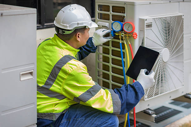 Professional Heat Pump Repair technician working in Pinopolis, SC